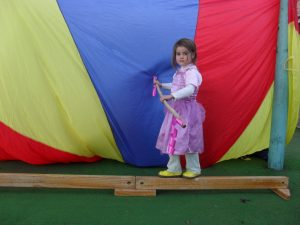 A young girl engaged in childhood development in Broadmeadow